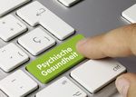 Foto: Auf einer Computertastatur ist eine Taste mit "Psychischer Gesundheit" beschriftet