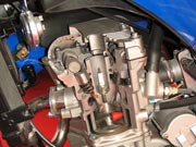 Foto: Ein Motorrad Motor seitlich aufgeschnitten.