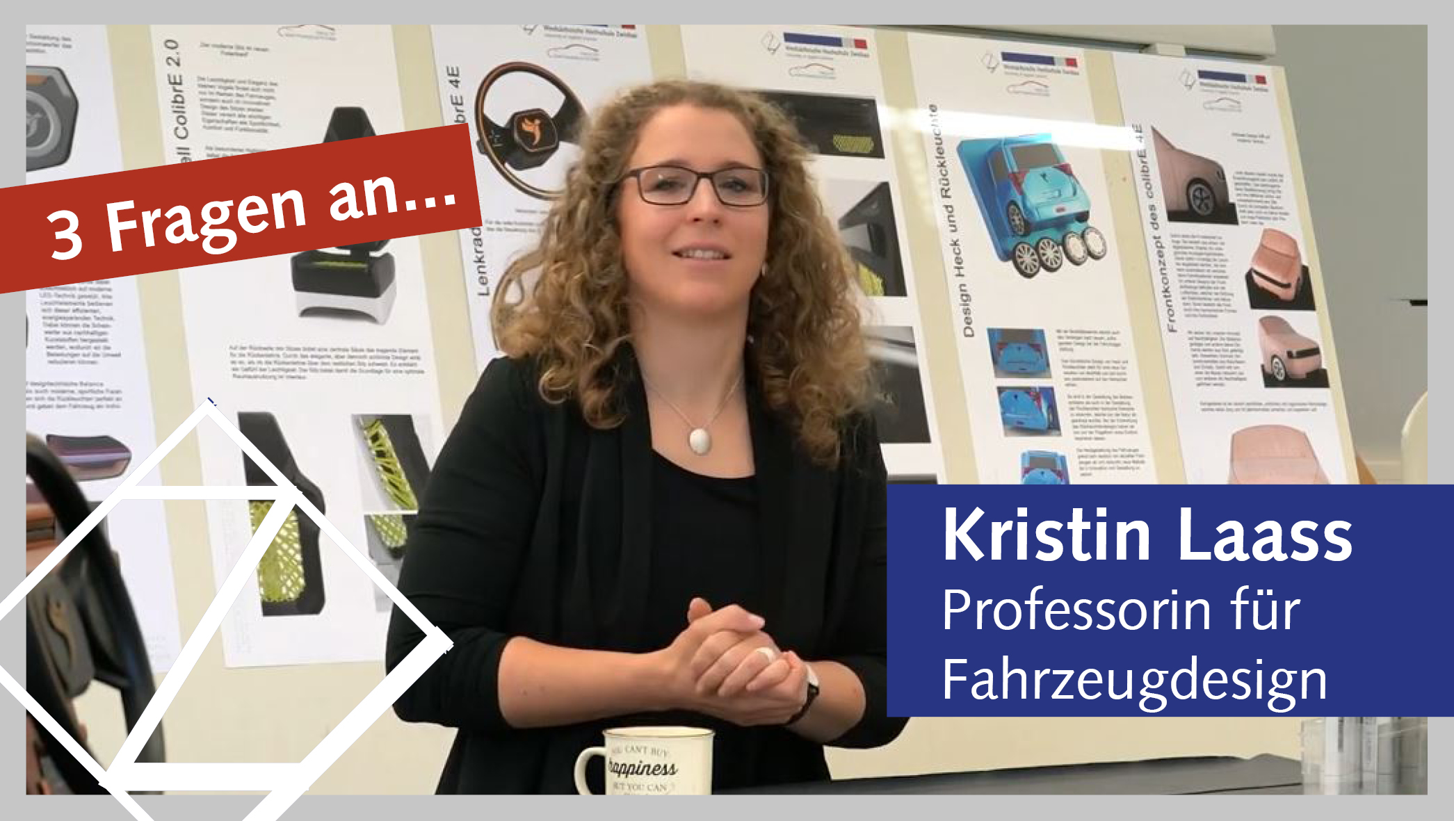 Professorin Kristin Laass vor Plakaten mit Deisgnentwürfen, schaut in Kamera