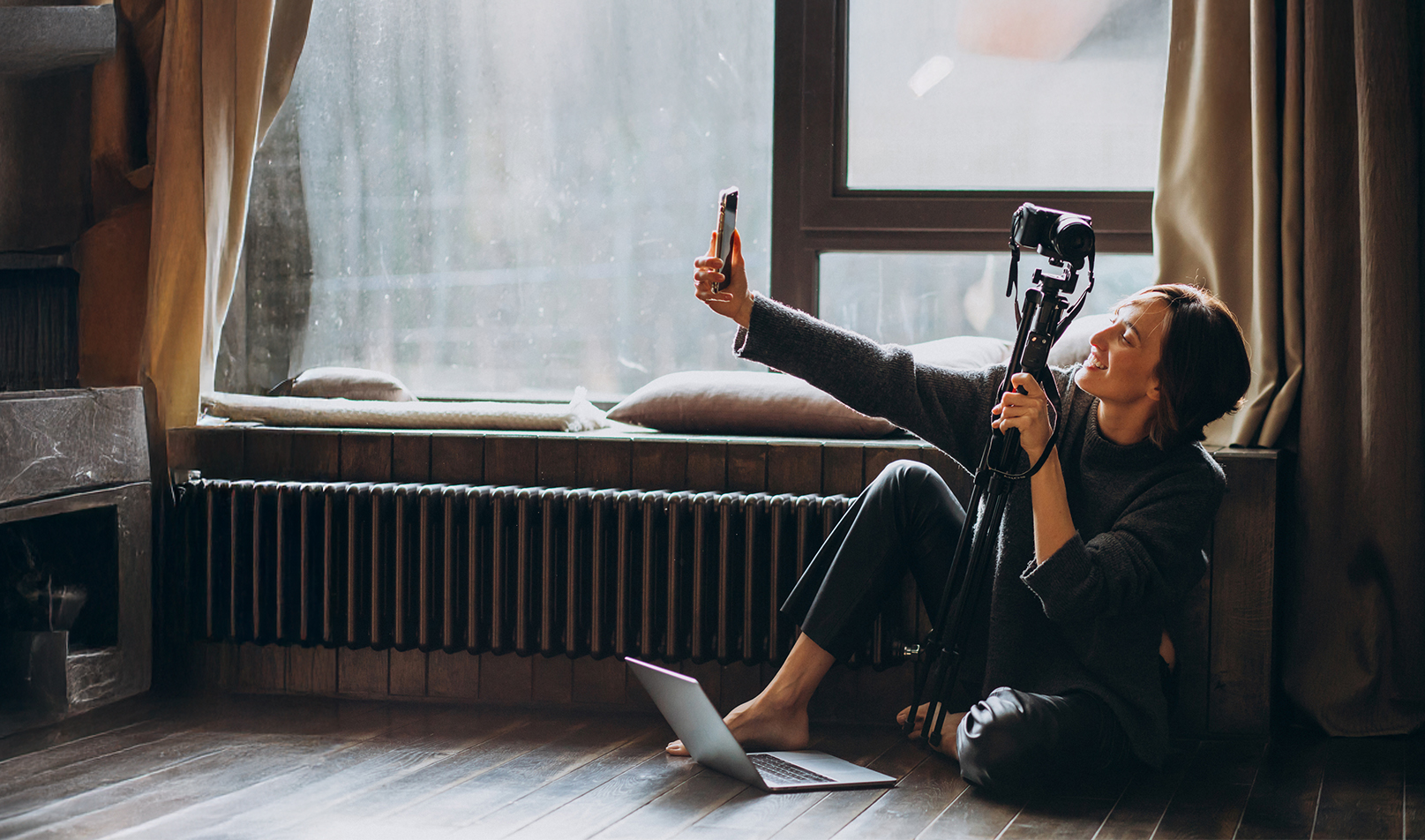 Young video blogger making a video review for her vlog 